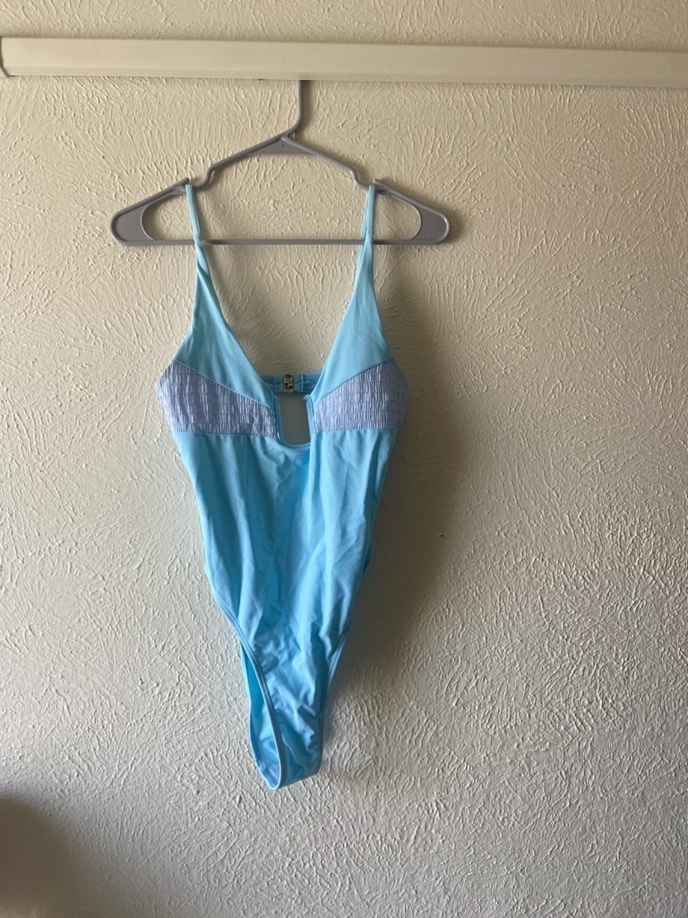 Light Blue One-Piece Swimsuit with Front Accents